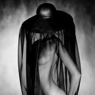 Nude under black hat 1980